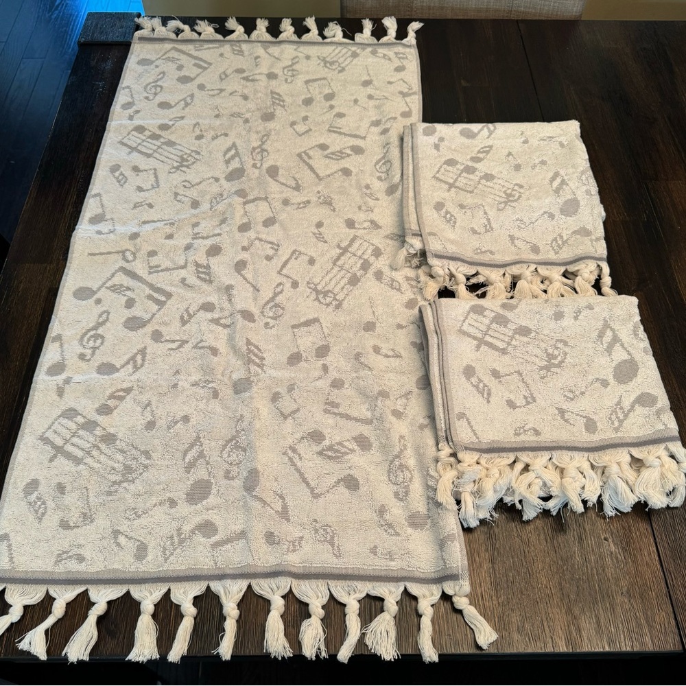 Three Decorative Towels with imprinted music notes. New never used.